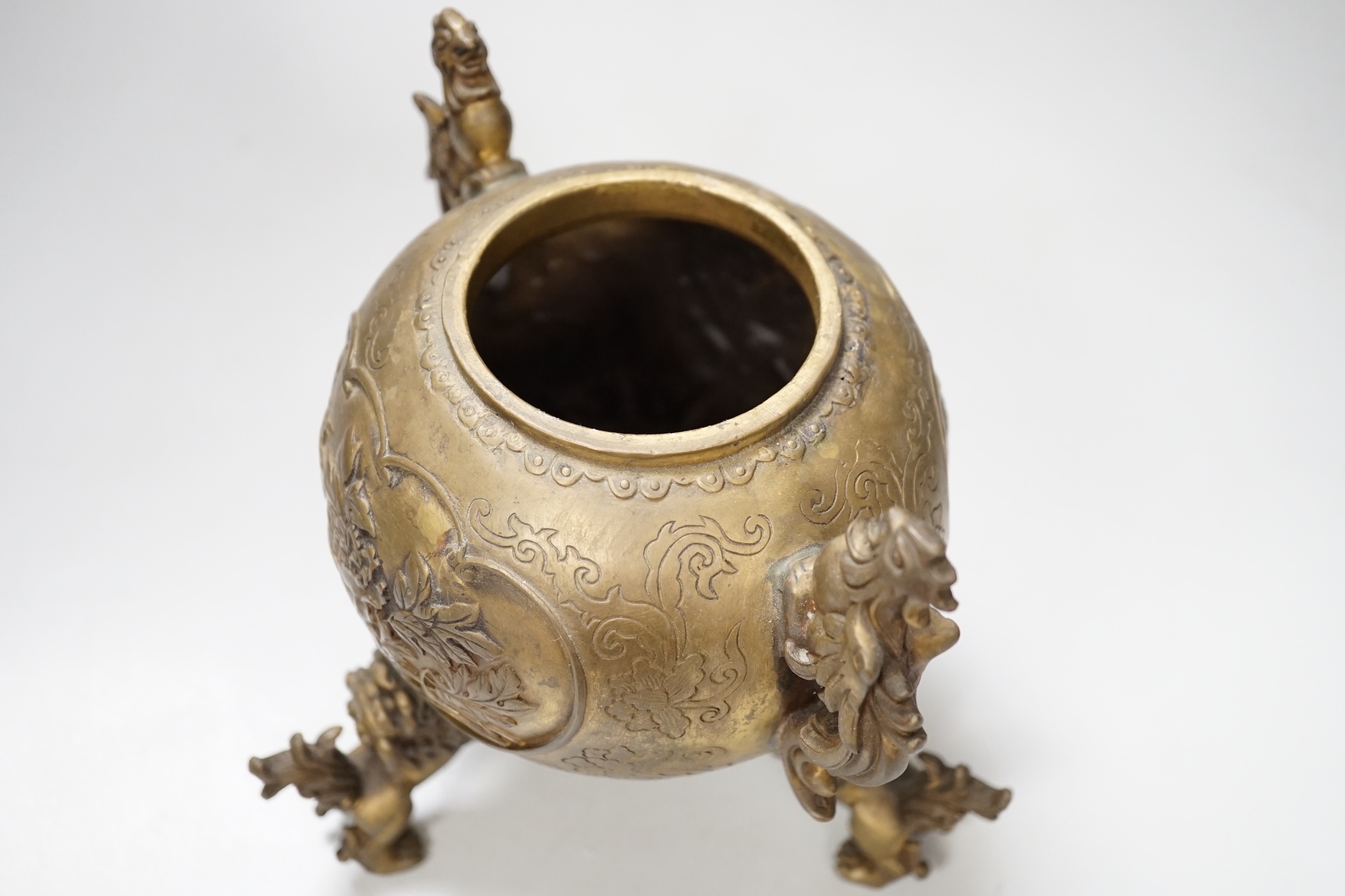 A Japanese bronze shi-shi footed censer and cover, 22cm high